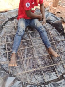 youth_sitting_gate